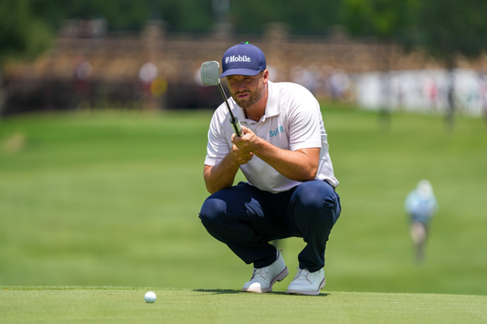 May 24, 2026; McKinney, Texas - Wyndham Clark lines up a putt on the first green during the final round of THE CJ CUP Byron Nelson. Credit: Raymond Carlin III-Imagn Images