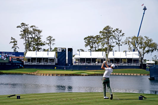 Justin Thomas plays his shot from the 17th tee during the third round of The Players Championship at TPC Sawgrass - Stadium Course