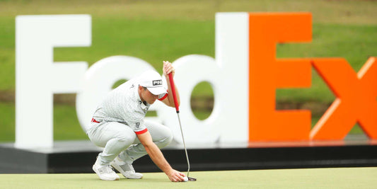 Viktor Hovland lines up his putt on the eighteenth hole during the third round of the 2023 FedEx St. Jude Championship at TPC Southwind